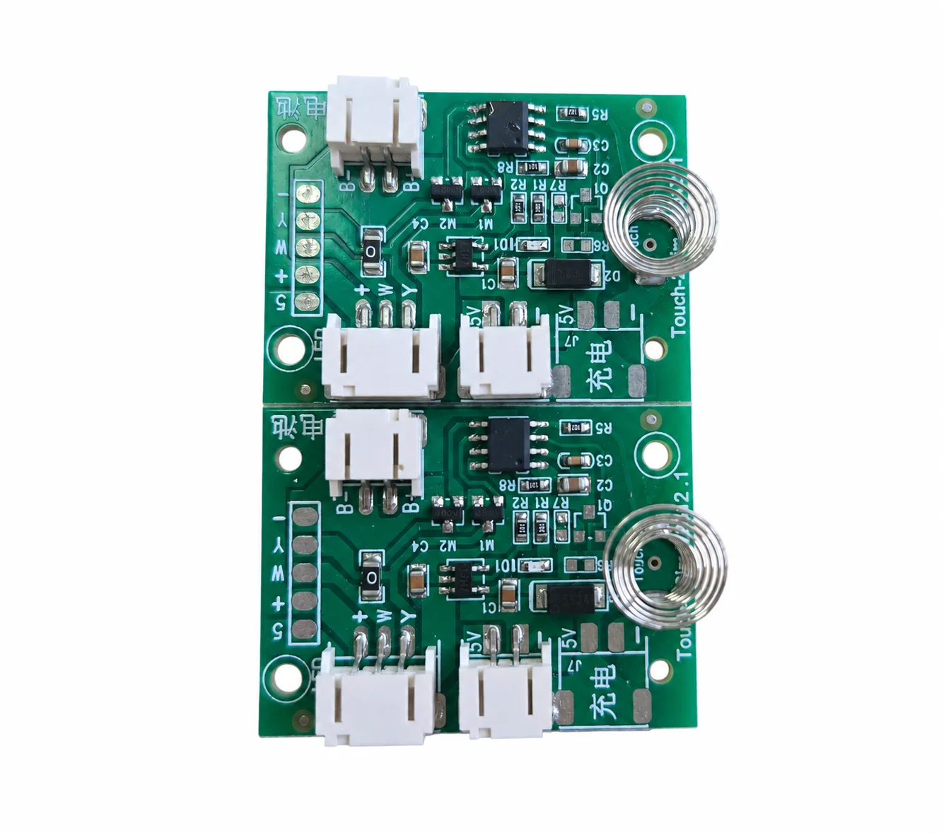 Original photograph of two capacitive touch control boards with spring electrodes and connectors
