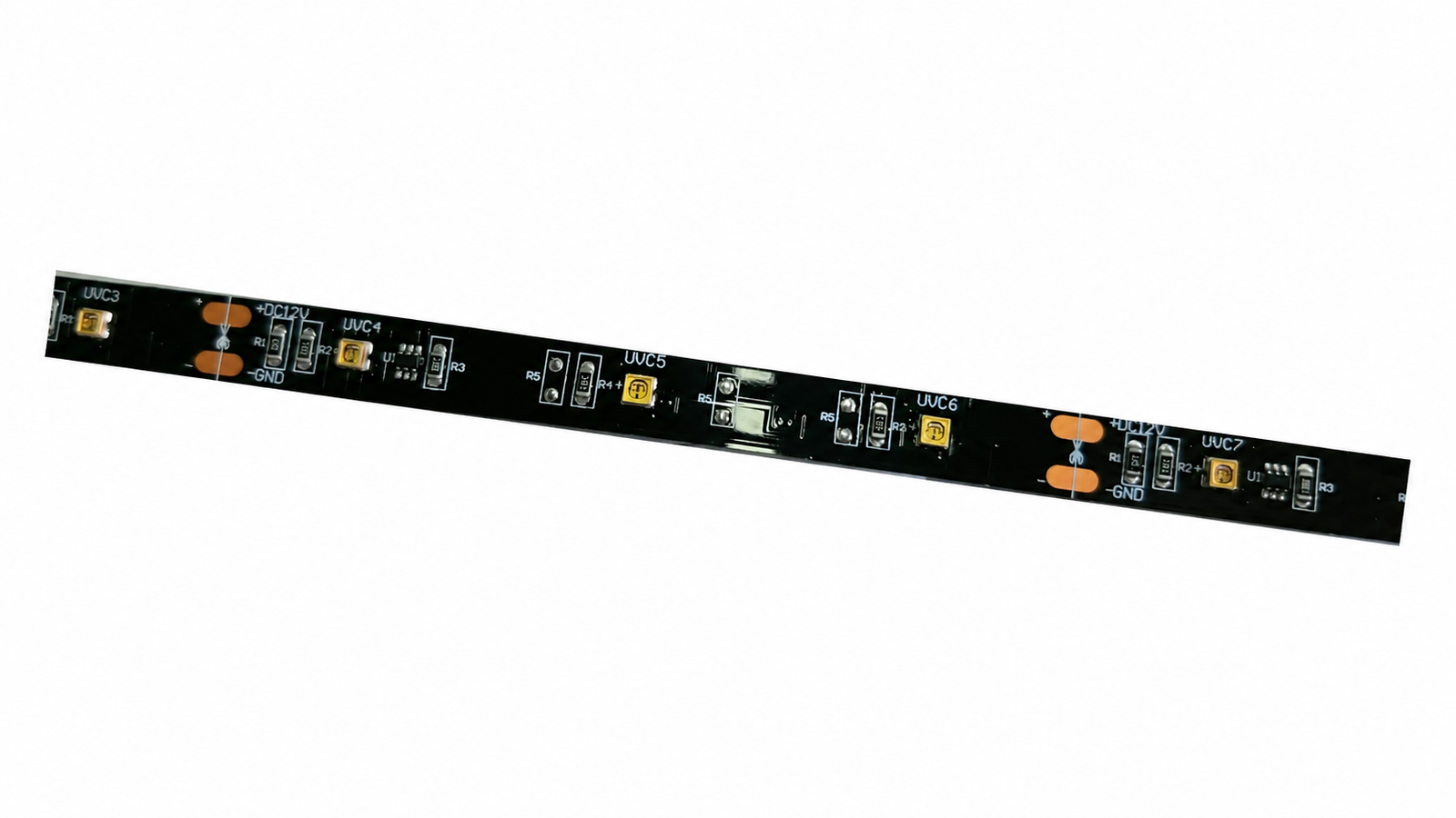 White-background presentation of a flexible LED strip with scissor cut marks, copper pads and three LED positions between adjacent cut lines