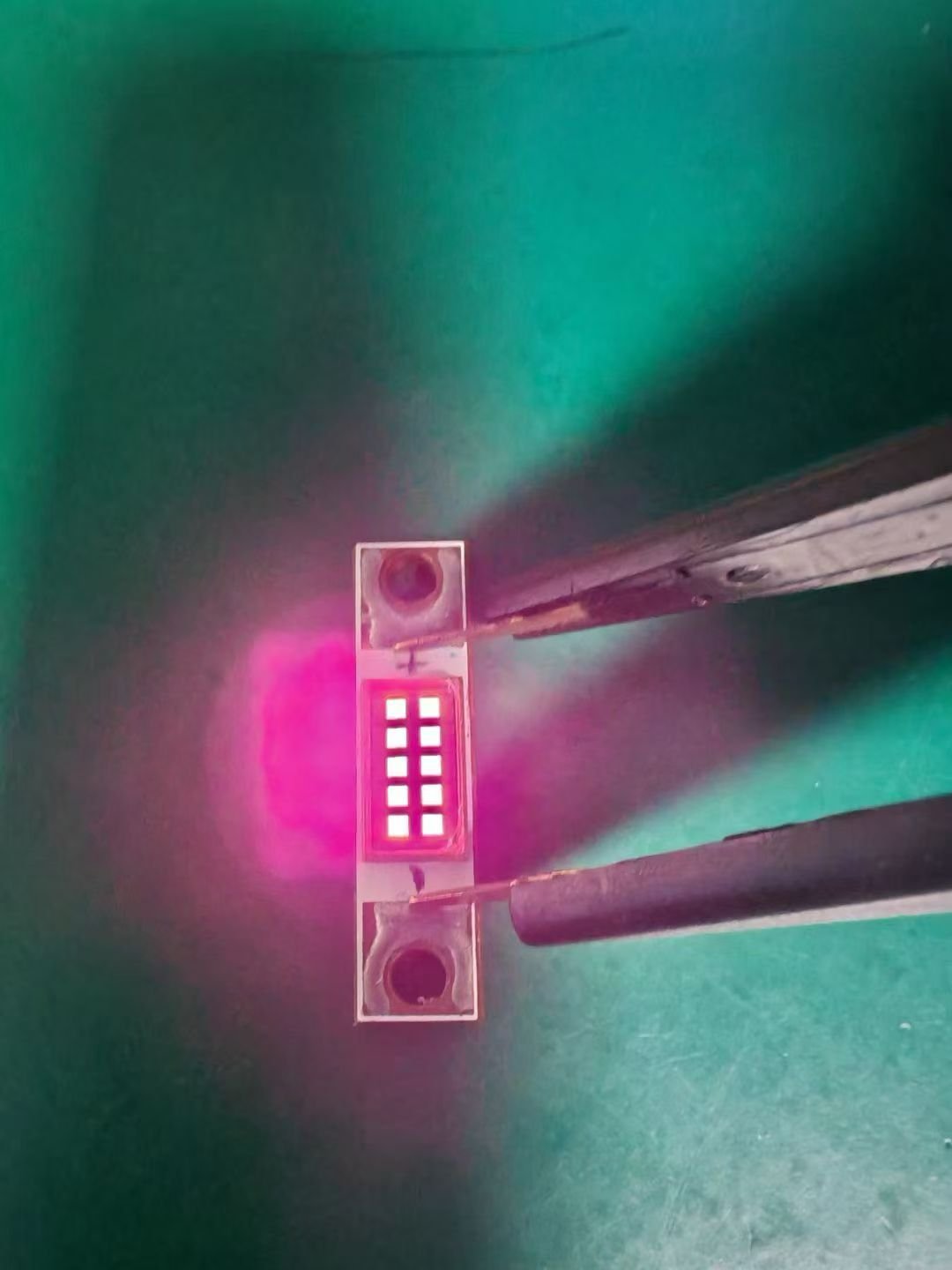 Compact linear assembly photographed during a powered bench test